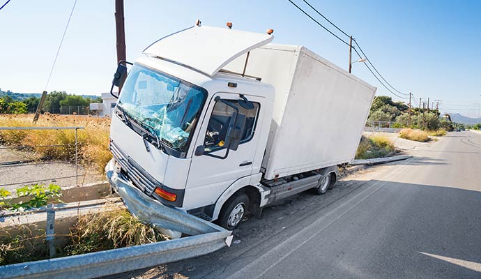 White box truck crashed into guardrail White box truck crashed into guardrail